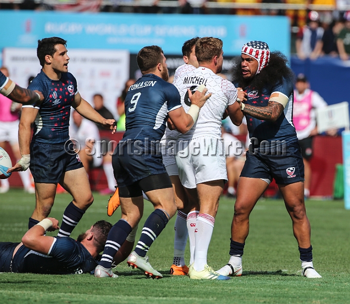 2018RugbySevensSat-31.JPG - Players react in the men's championship quarter finals between the United States and England in the 2018 Rugby World Cup Sevens, Saturday, July 21, 2018, at AT&T Park, San Francisco. England defeated USA 24-19 in sudden death play. (Spencer Allen/IOS via AP)